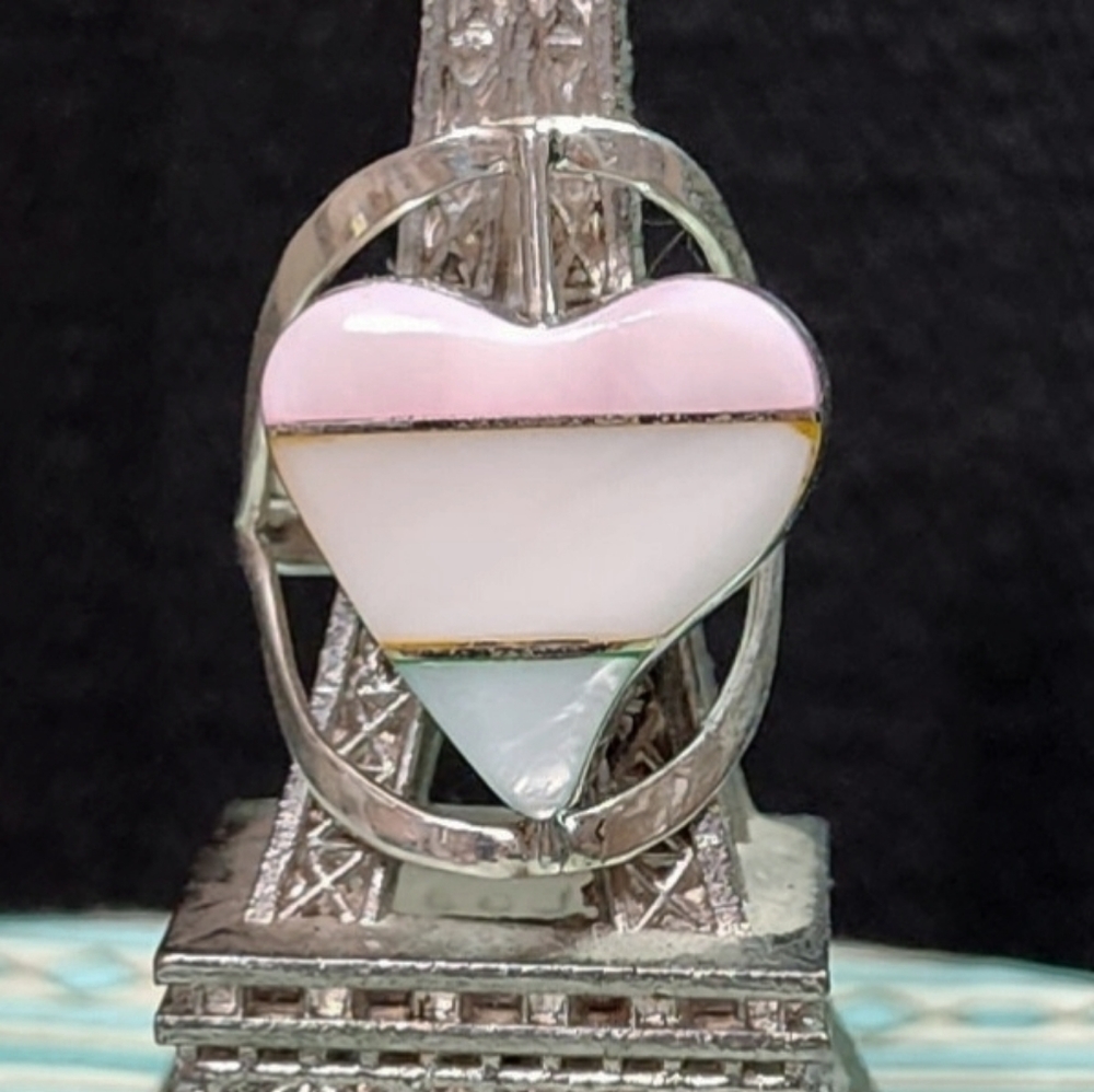 Two-sided 925 silver ring.